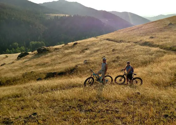 Two people fat tire biking during fall in Johnson County Wyoming
