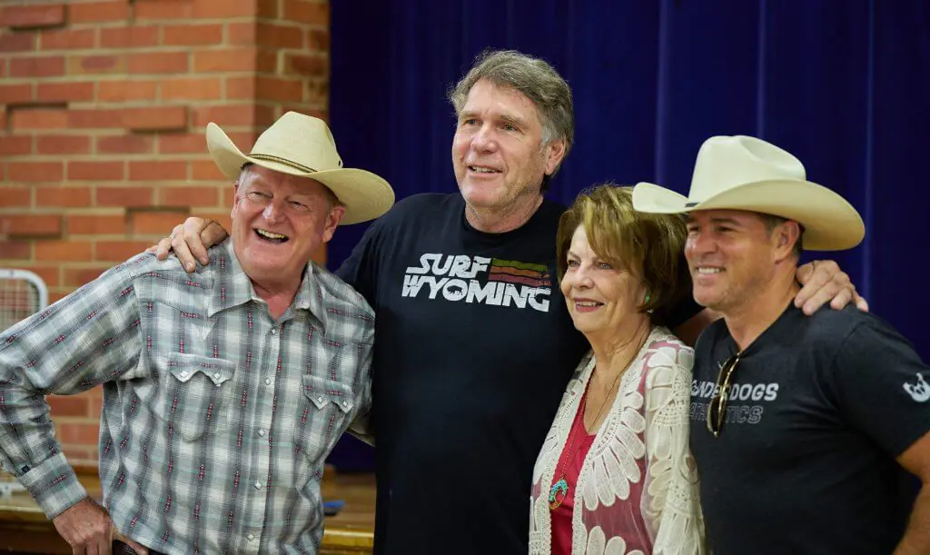 Longmire series author Craig Johnson poses for photos with actors Robert Taylor, Louanne Stephens and Derek Phillips during a Longmire Days autograph session in the gym of the Bomber Mountain Civic Center in Buffalo Wyoming.