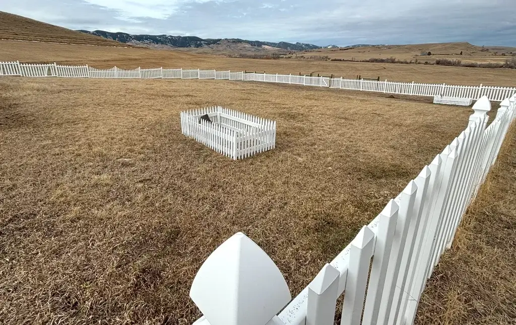 A fenced area in Fort Phil Kearny, a place to see ghosts near Buffalo, WY, marking the burial of homesteaders.