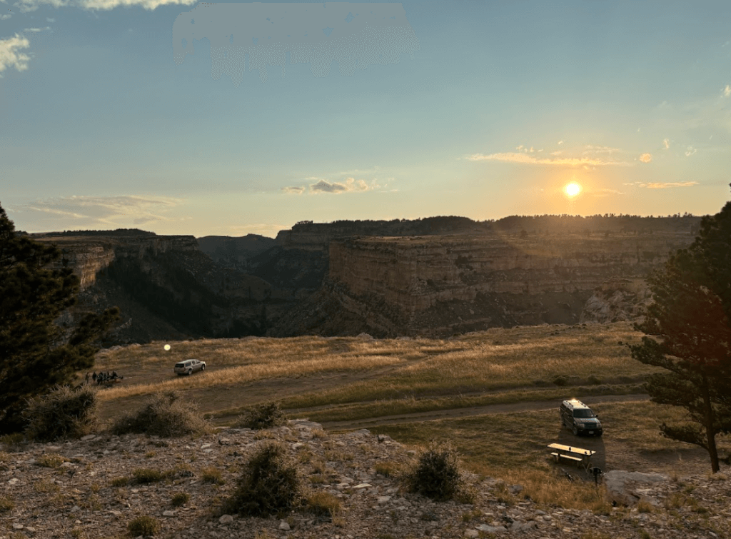 Two SUVs parked in the Outlaw Canyon Campground 